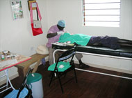 A locally trained surgeon operates in the new clinic.